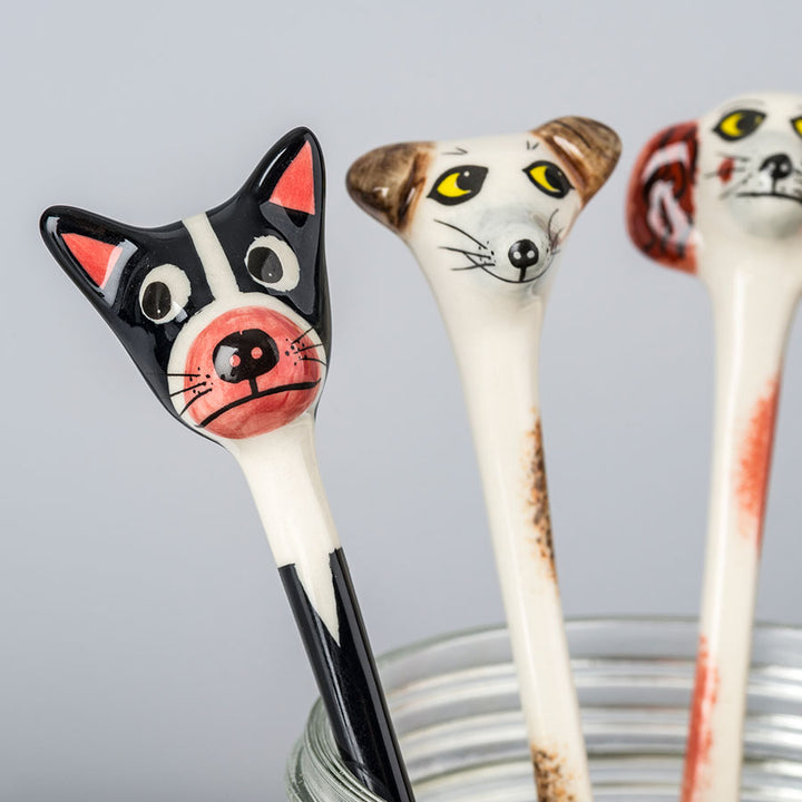 Four Dog Spoons in a box by Hannah Turner, the perfect presents for a dog walker