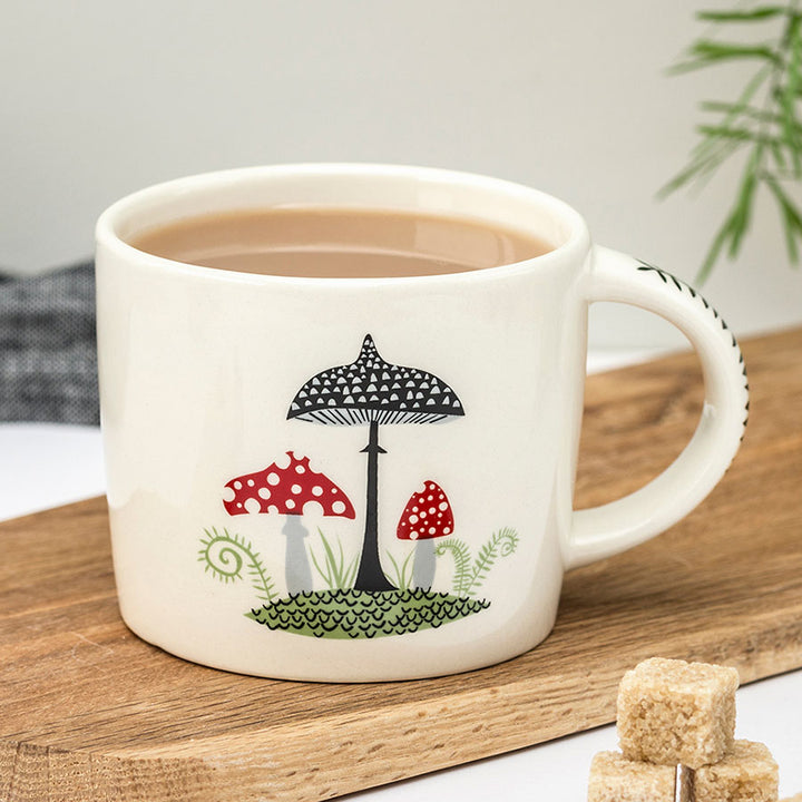 Handmade Ceramic Toadstool Mug by Hannah Turner