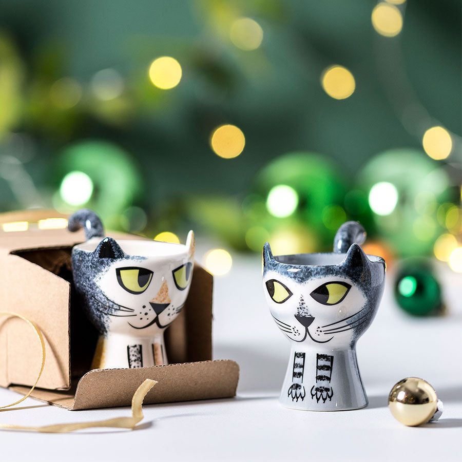 Tortoiseshell and grey tabby egg cups by Hannah Turner