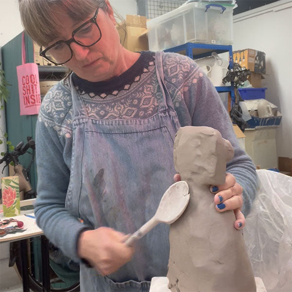 Hannah Turner working with clay