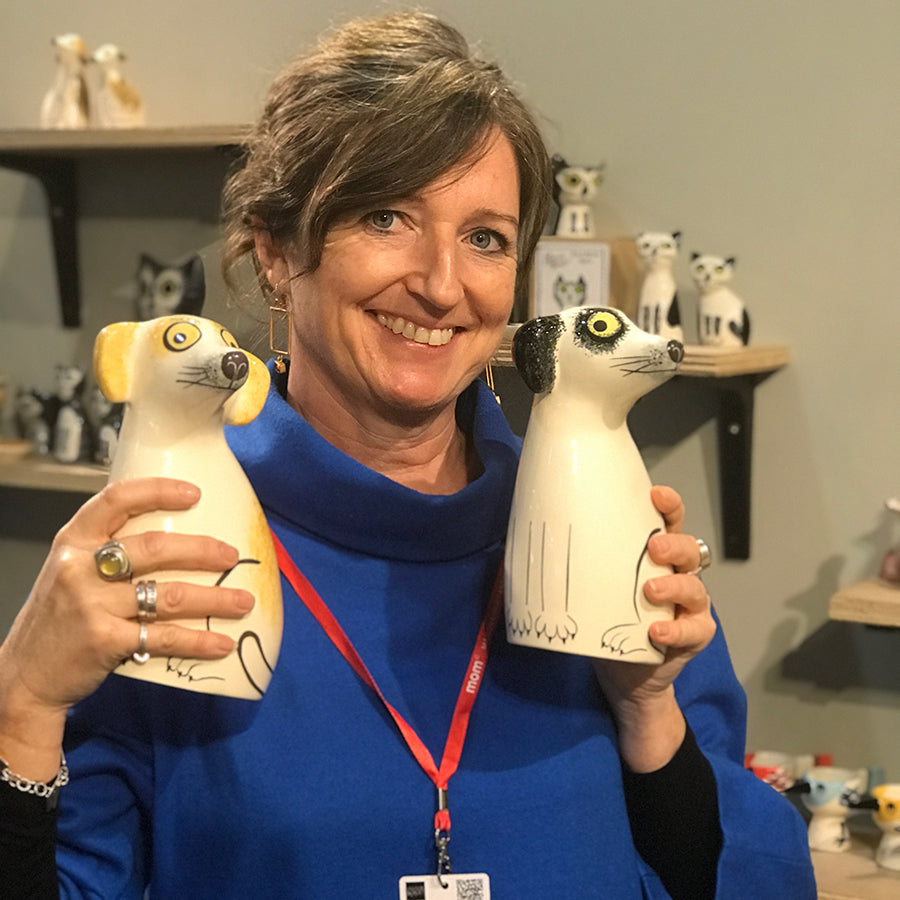 Hannah with her Dog Money Boxes