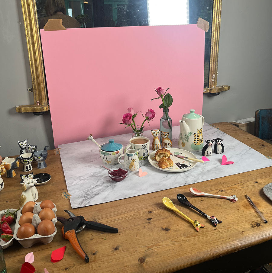 a valentines day photoshoot BTS with the cat collection tableware by Hannah Turner
