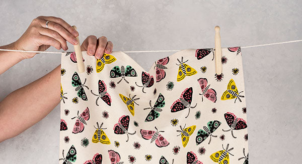 Organic Cotton Tea Towel with Moth design by Hannah Turner