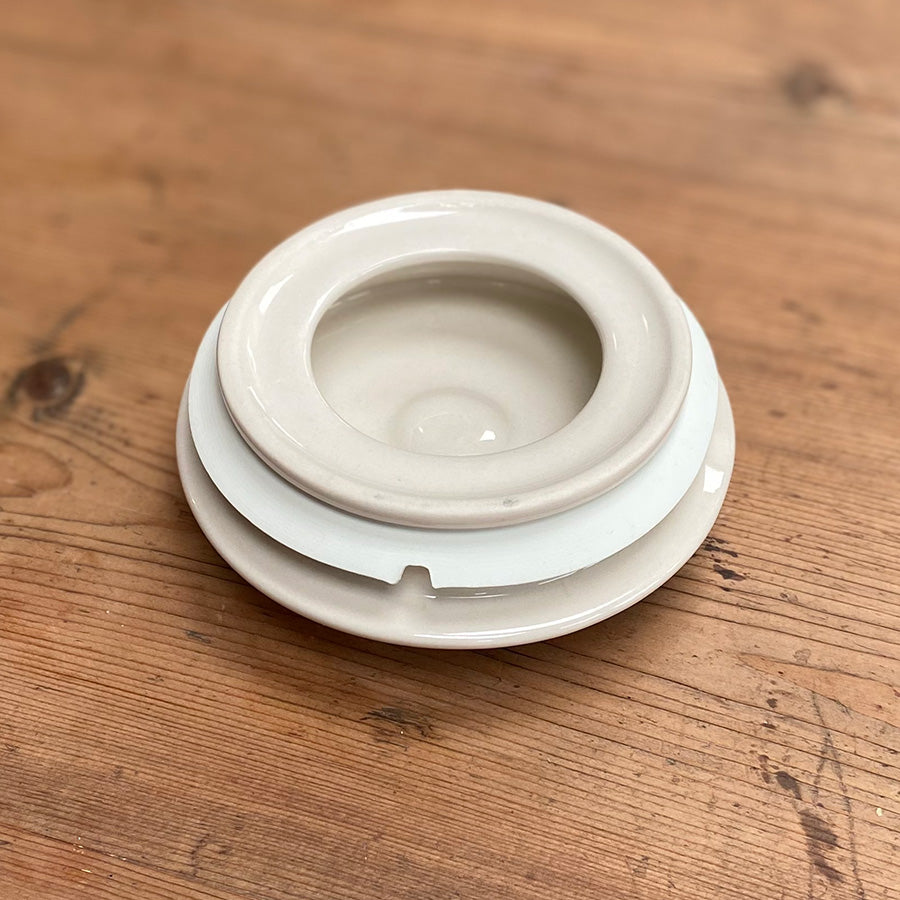 White ceramic bowl on a wooden surface