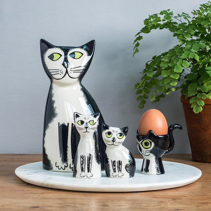 Hannah Turner Black and White Cat Collection, showing egg cup, salt and peppers and money box.