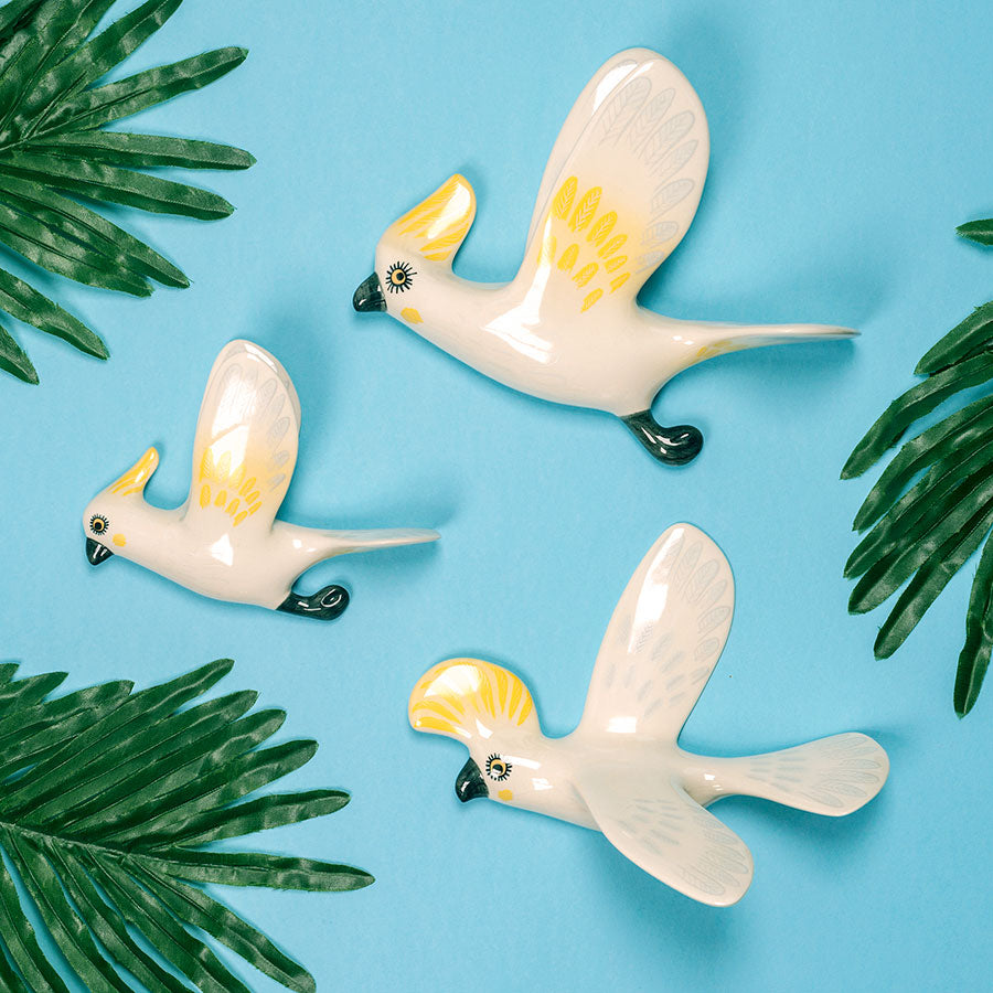 Handmade Ceramic Flying Cockatoo wall-mounted Trio by Hannah Turner