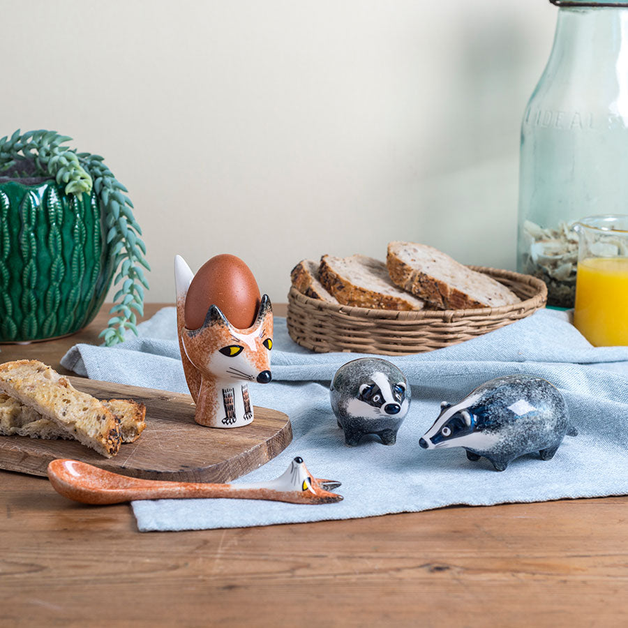 Fox egg cup and sppon and badger salt and pepper shakers by Hannah Turner
