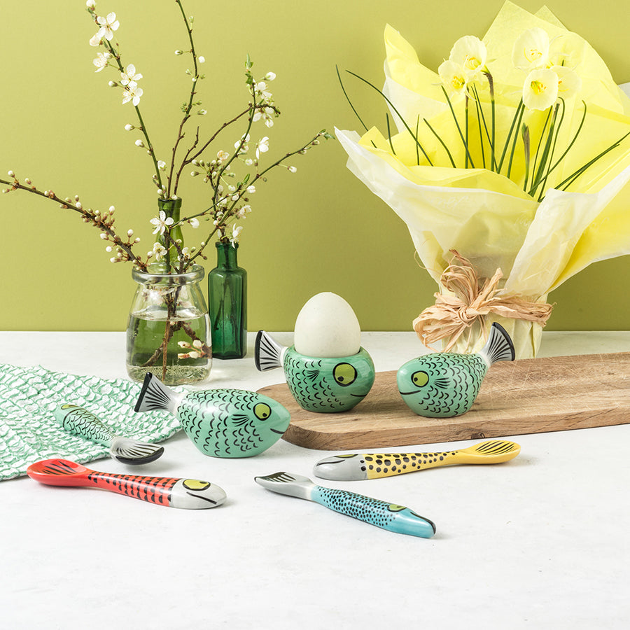 Handmade ceramic green fish egg cup, spoons and salt and pepper shakers by Hannah Turner