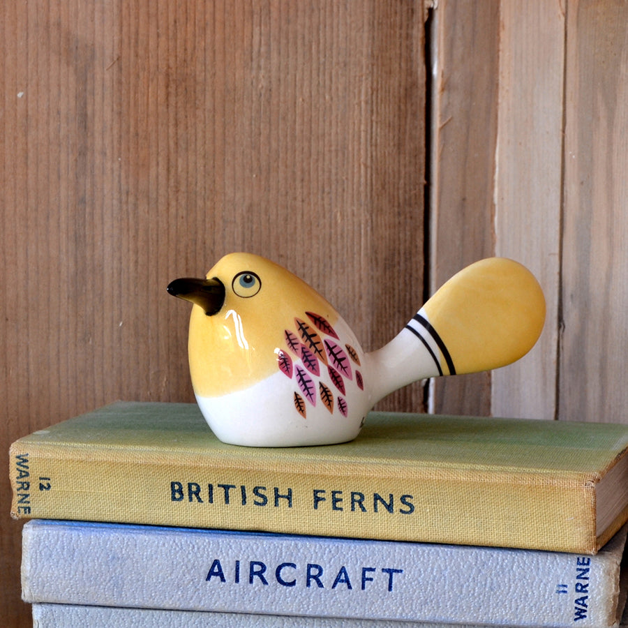 Orange fantail bird ornament by Hannah Turner