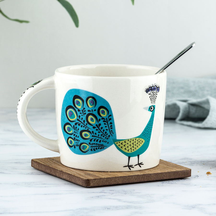 Handmade Ceramic Peacock Mug by Hannah Turner